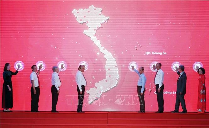 Chủ tịch nước Nguyễn Xuân Phúc dự Lễ phát động Tháng Nhân đạo năm 2022